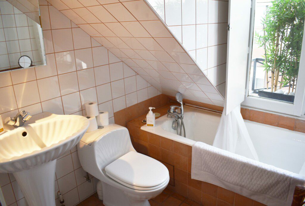 bathroom with tub sink scaled