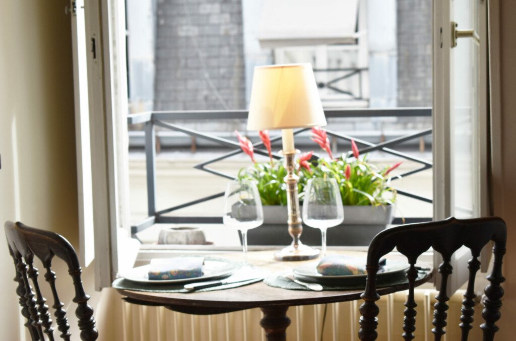 dining table by window scaled