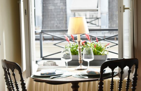 Luxury studio Rue Saint-Honoré Paris 1st – dining table set for two with terrace view